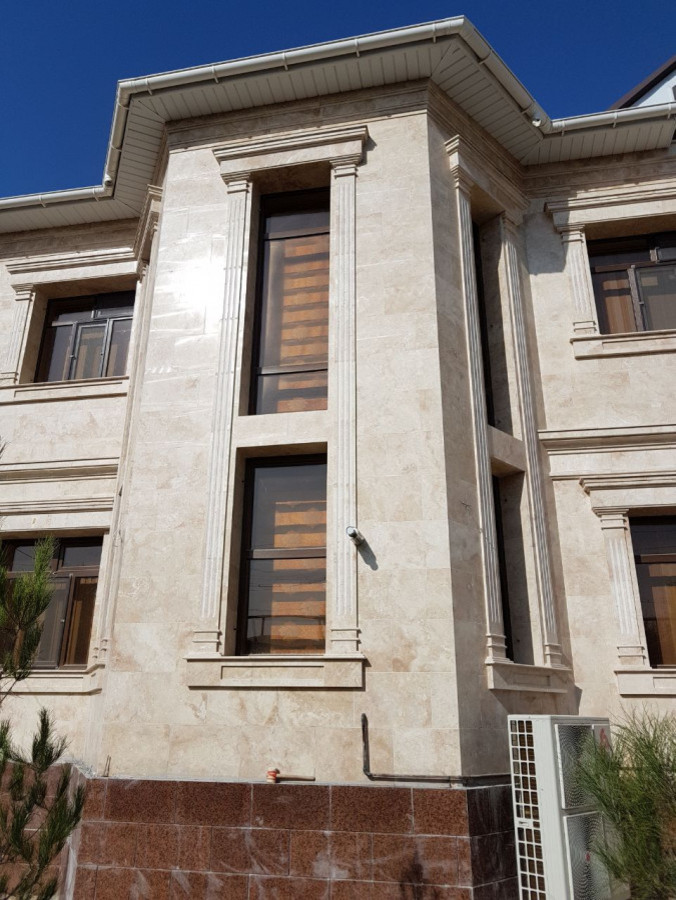 облицовка фасадов травертином из Ирана