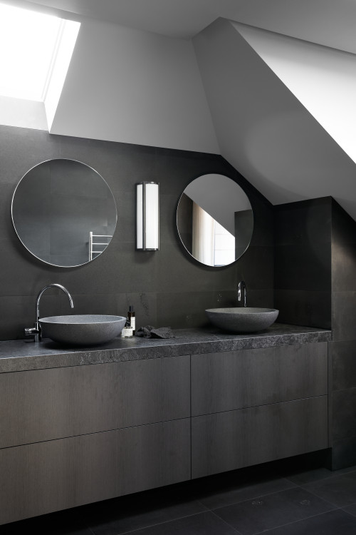 Subtle Contrast: Nickel Fixtures and Black Vanity