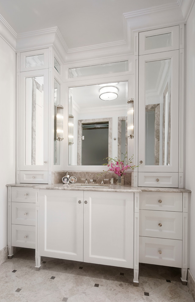 Inspiration for a large traditional master bathroom in Chicago with recessed-panel cabinets, white cabinets, white walls, limestone floors, an undermount sink, limestone benchtops, beige floor, beige benchtops, a single vanity, a built-in vanity and recessed.