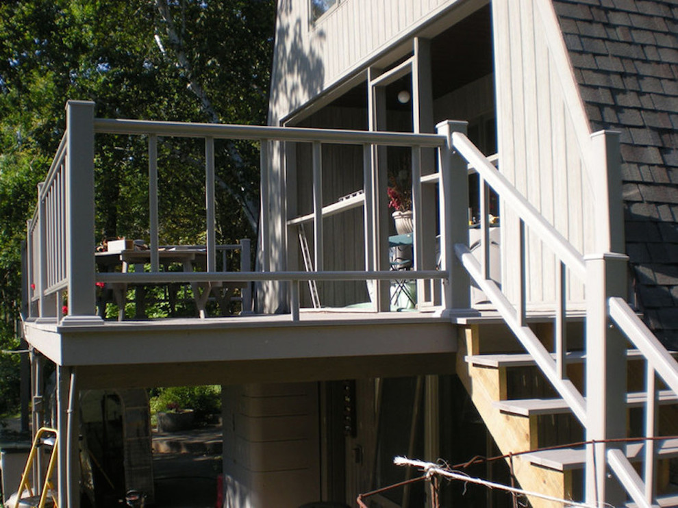 Inspiration for a mid-sized backyard balcony deck remodel with no cover