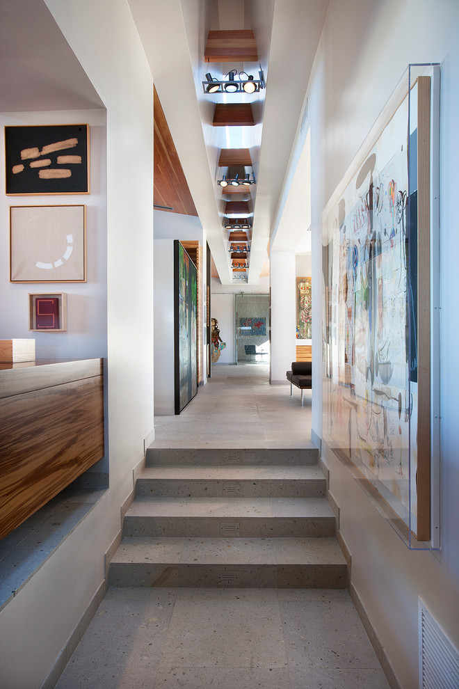 Expansive contemporary hallway in Phoenix with white walls.