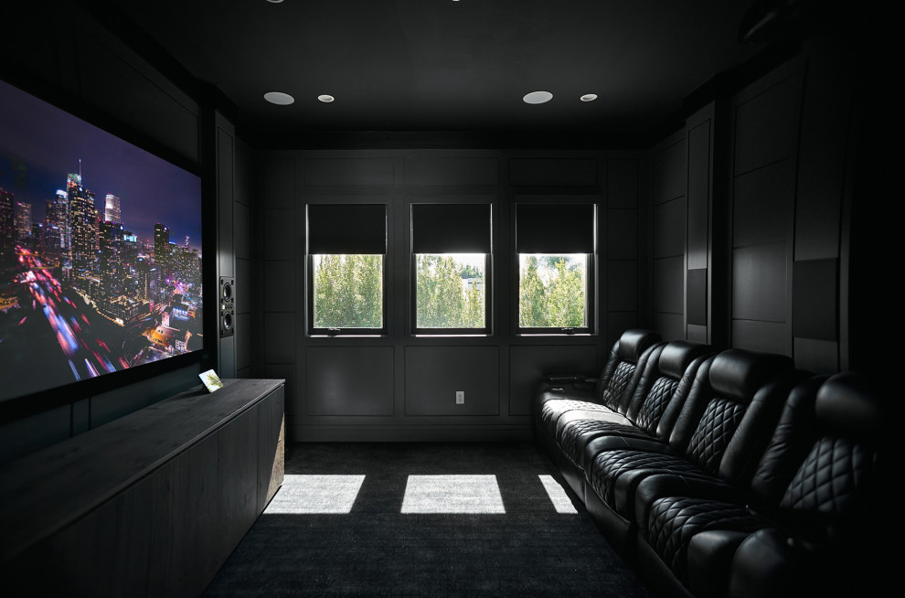 Inspiration for a small contemporary enclosed carpeted and black floor home theater remodel in Los Angeles with gray walls and a projector screen