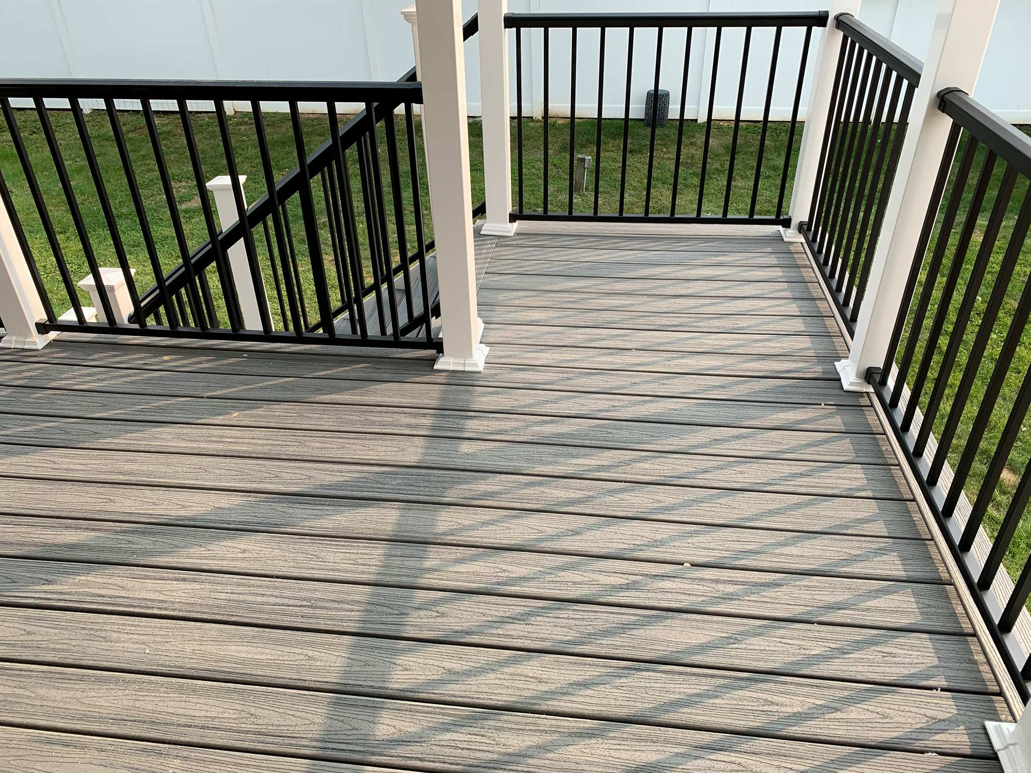Resurfaced old deck with Trex transcends Island Mist Color