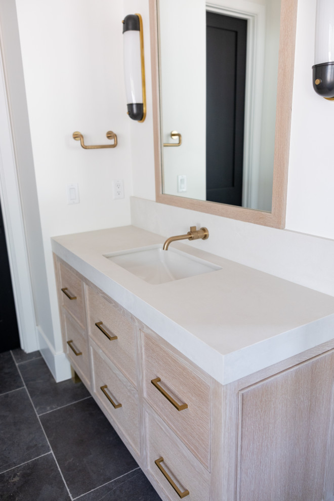 Example of a large transitional master white tile and porcelain tile porcelain tile, gray floor, double-sink, coffered ceiling and wainscoting freestanding bathtub design in Phoenix with recessed-panel cabinets, light wood cabinets, a bidet, white walls, an undermount sink, marble countertops, a hinged shower door, white countertops, a niche and a freestanding vanity