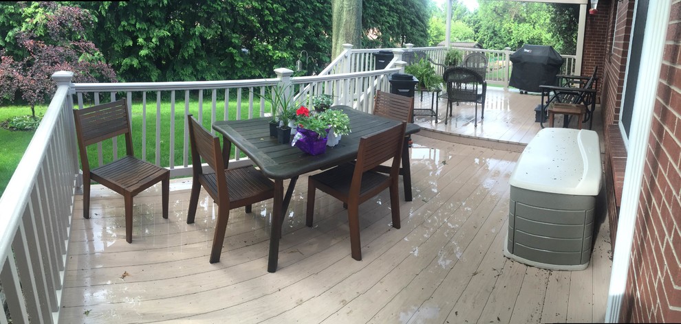 Deck - mid-sized transitional backyard deck idea