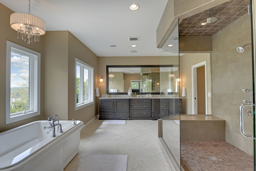 Photo of a transitional bathroom in Minneapolis with a freestanding tub.