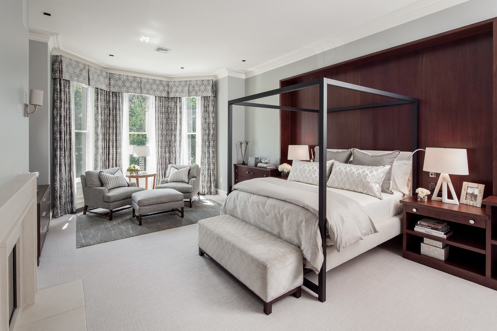 Transitional bedroom in Boston with grey walls and carpet.