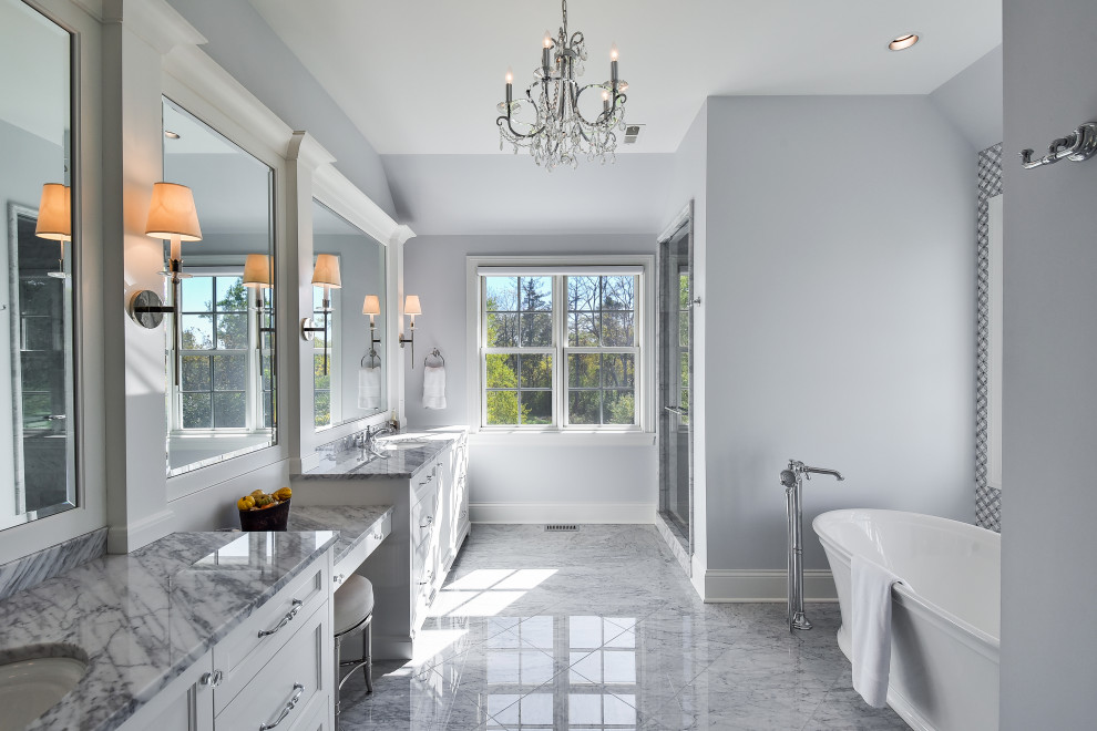 Large elegant master marble floor, gray floor and double-sink bathroom photo in Chicago with recessed-panel cabinets, white cabinets, a two-piece toilet, gray walls, an undermount sink, marble countertops, a hinged shower door, gray countertops, a niche and a built-in vanity