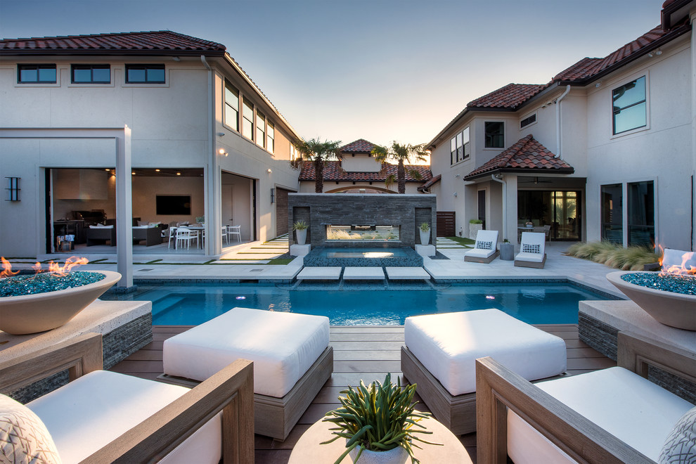 This is an example of an expansive modern rectangular pool in Dallas.