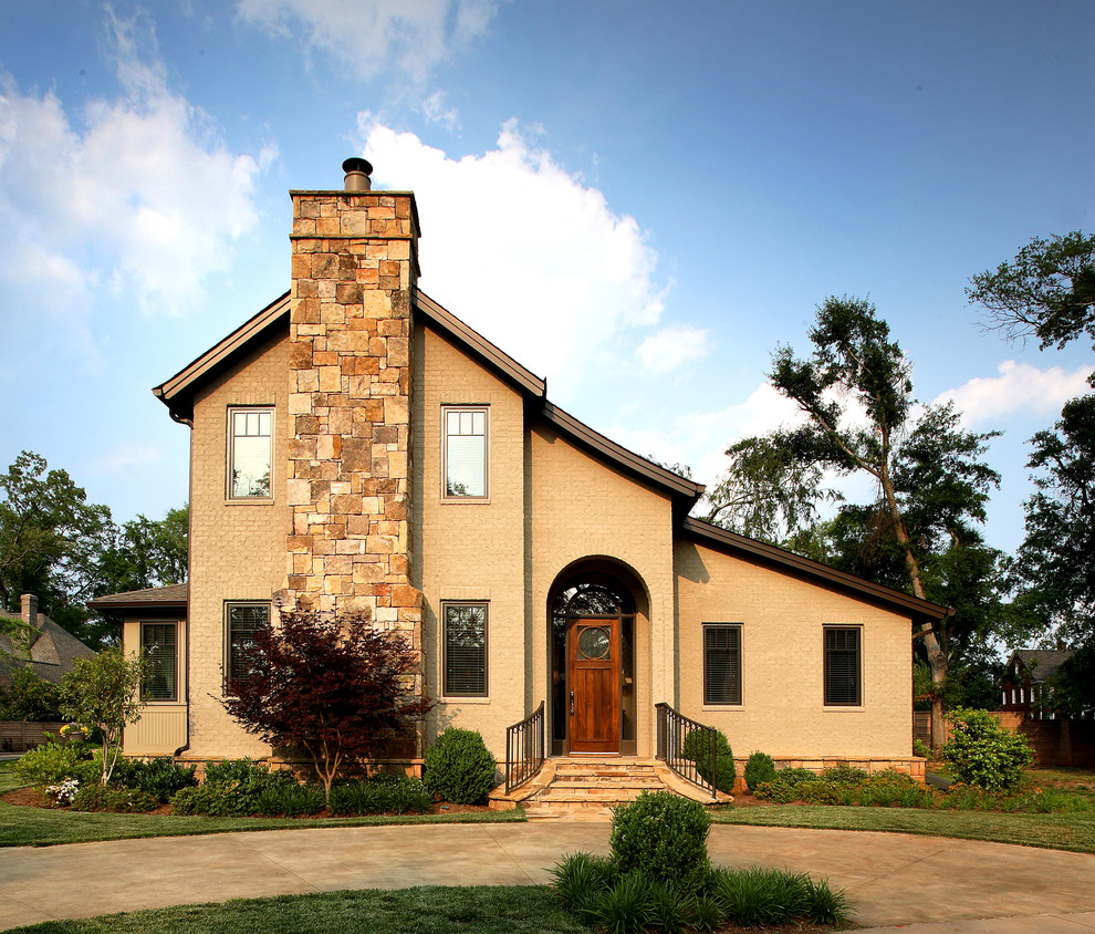 Mid-sized traditional two-storey brick beige exterior in Atlanta.