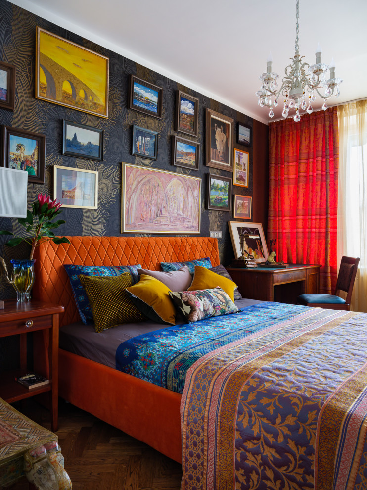 Small eclectic master bedroom in Moscow with multi-coloured walls, dark hardwood floors, no fireplace, brown floor and wallpaper.