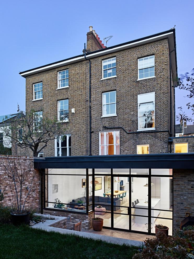 Mittelgroße Moderne Wohnküche mit grauem Boden in Surrey
