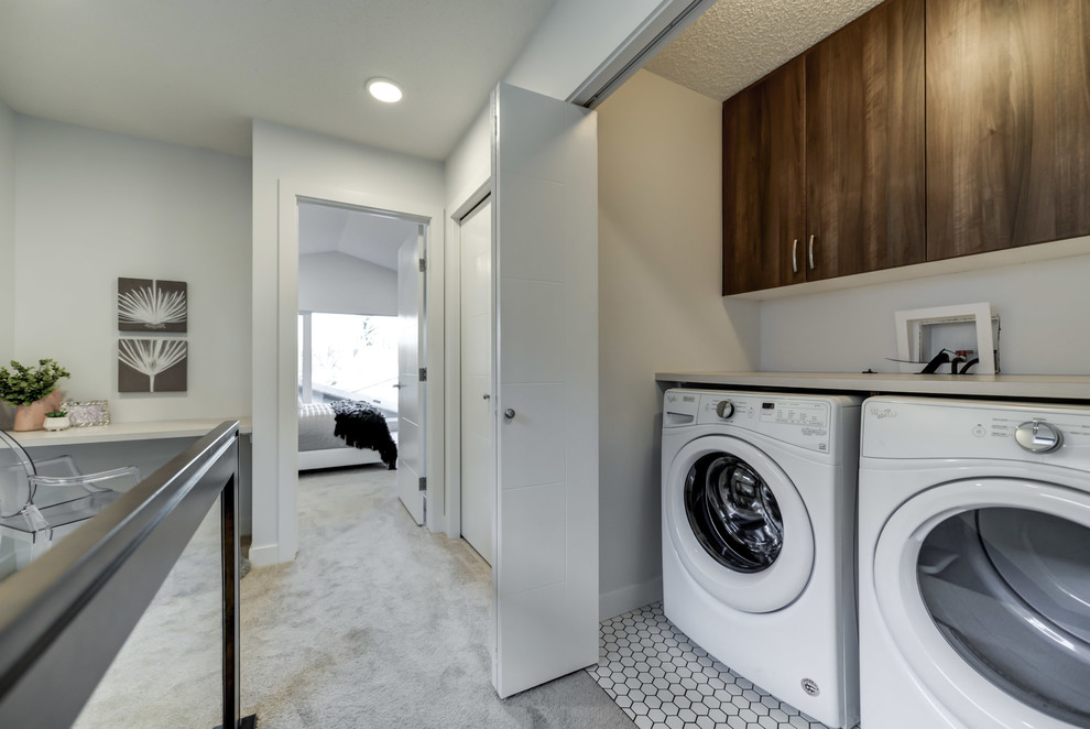 Inspiration for a small contemporary single-wall laundry cupboard in Edmonton with flat-panel cabinets, brown cabinets, laminate benchtops, white walls, ceramic floors, a side-by-side washer and dryer, white floor and white benchtop.