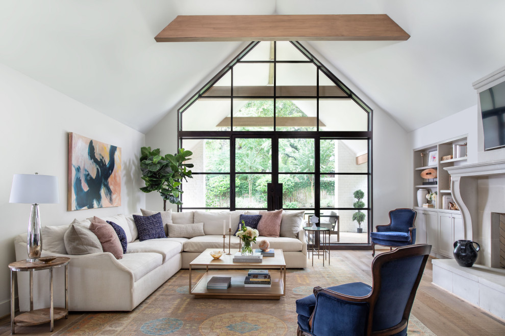 This is an example of a transitional living room in Houston.