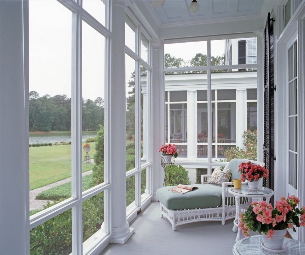 Inspiration for a traditional verandah in Charlotte with decking and a roof extension.