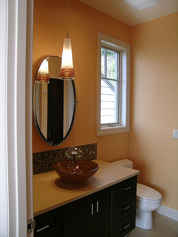 Example of a transitional powder room design in Seattle