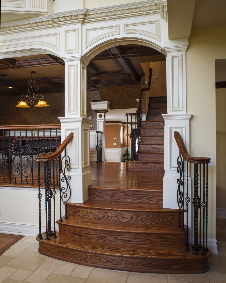 This is an example of a large traditional wood straight staircase in New York with wood risers.