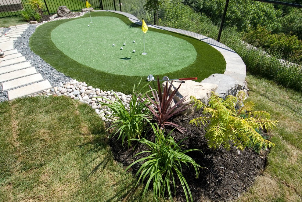 Design ideas for a small contemporary backyard full sun outdoor sport court for summer in Toronto with gravel.