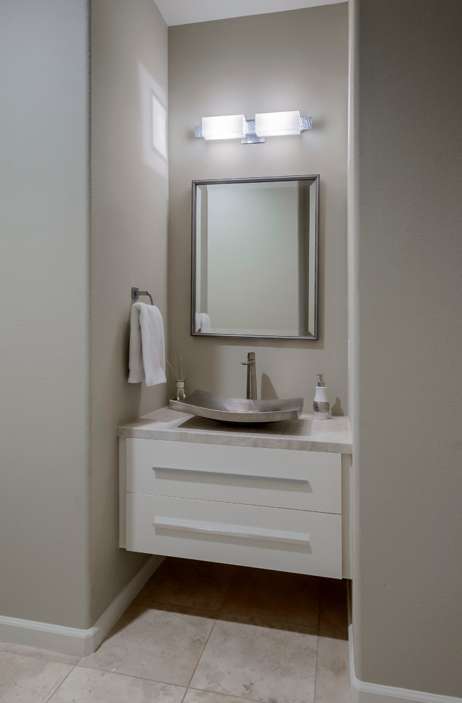 Design ideas for a mid-sized contemporary powder room in San Francisco with flat-panel cabinets, white cabinets and porcelain floors.