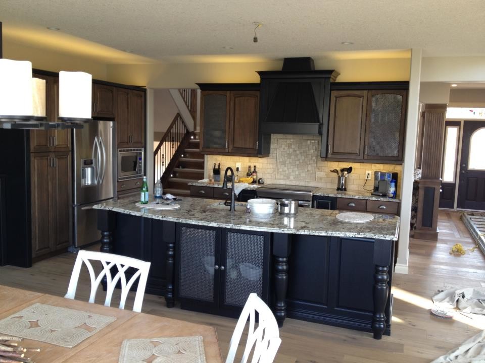 Example of a mountain style kitchen design in Calgary