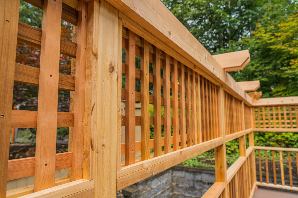 Example of a mid-sized backyard deck design in Seattle