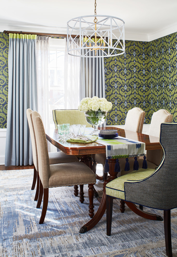 Inspiration for an eclectic dining room in New York with multi-coloured walls.