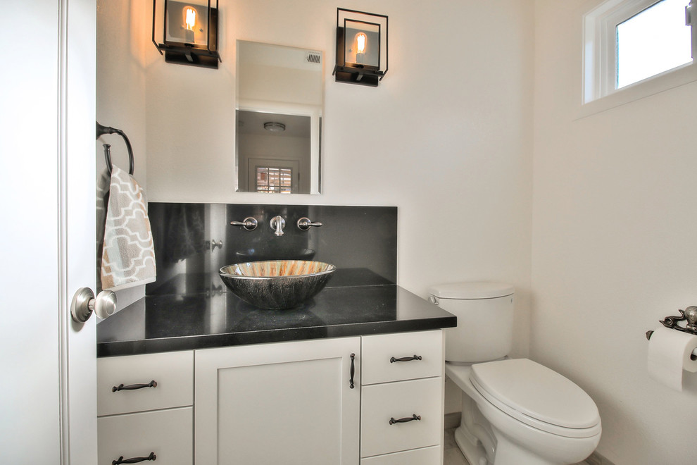 Inspiration for a small contemporary 3/4 bathroom in San Francisco with shaker cabinets, white cabinets, a two-piece toilet, white tile, white walls, porcelain floors, a vessel sink, engineered quartz benchtops and white floor.