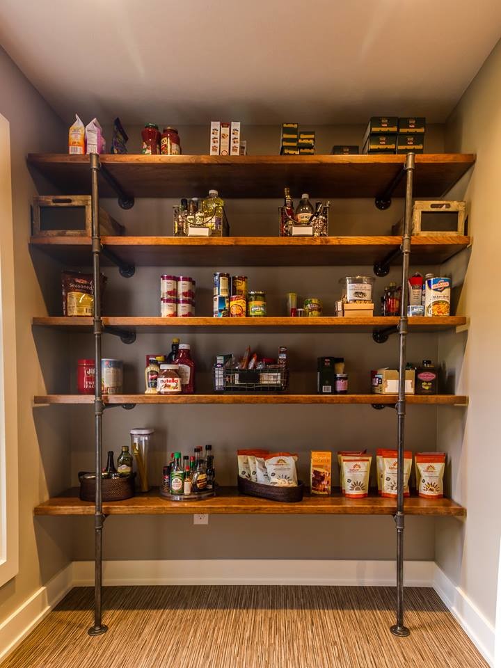 Photo of a mid-sized transitional single-wall kitchen pantry in Omaha with open cabinets and dark wood cabinets.
