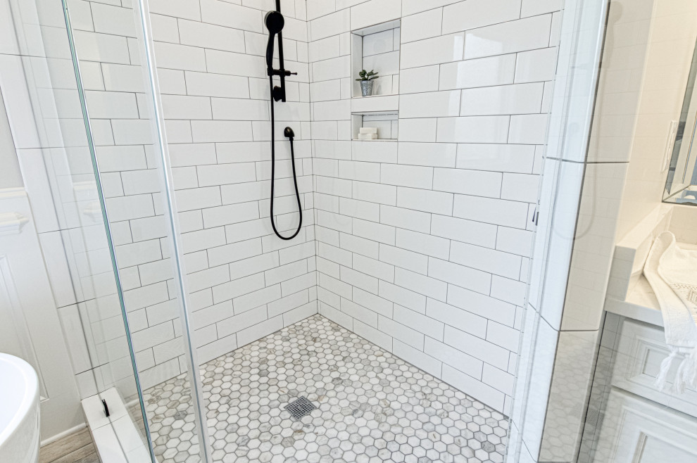 Mid-sized minimalist master white tile and ceramic tile wood-look tile floor, brown floor, double-sink and wainscoting bathroom photo in Other with white cabinets, a two-piece toilet, gray walls, an undermount sink, quartz countertops, a hinged shower door, white countertops and a built-in vanity
