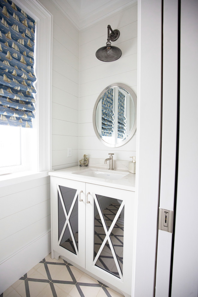 Small beach style 3/4 bathroom in Miami with glass-front cabinets, white cabinets, white walls, ceramic floors, a drop-in sink, quartzite benchtops, white floor, white benchtops, a single vanity, a built-in vanity and planked wall panelling.