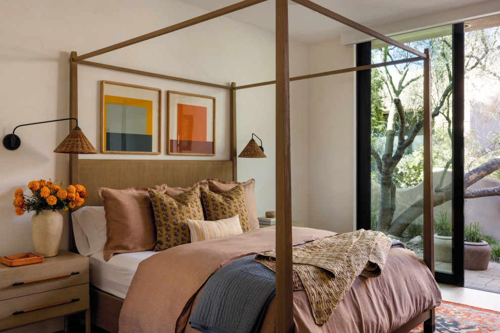 Large southwest guest light wood floor and beige floor bedroom photo in Other with beige walls