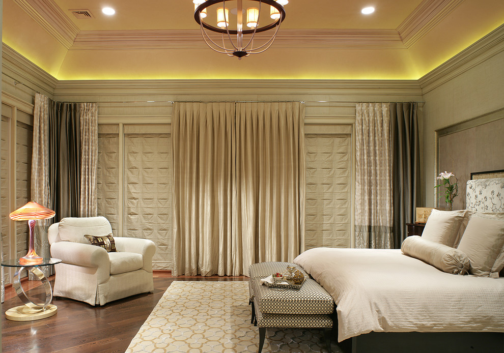 Photo of a transitional master bedroom in New York with beige walls, dark hardwood floors and no fireplace.