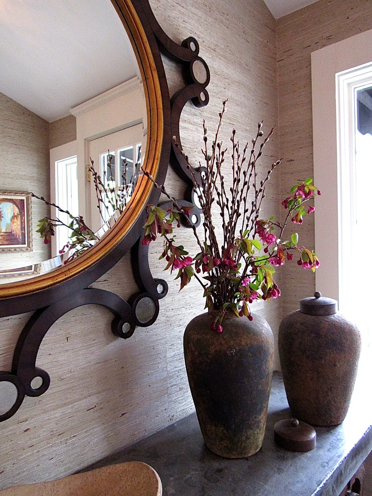 Example of a small transitional dark wood floor foyer design in Chicago
