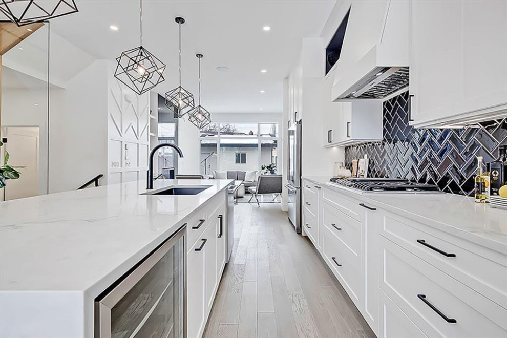 Transitional home design photo in Calgary