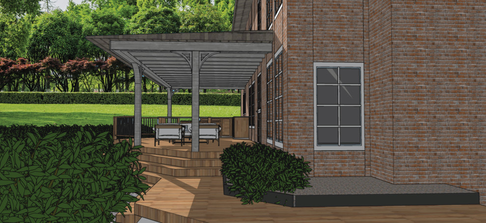 This is an example of a large backyard and ground level deck with an outdoor kitchen, a pergola and mixed railing.