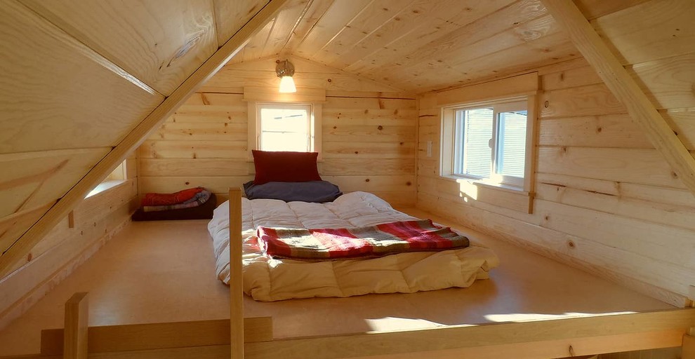 Inspiration for a small traditional loft-style bedroom in Portland with no fireplace.