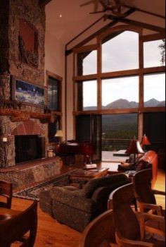 Example of a mountain style home design design in Orange County