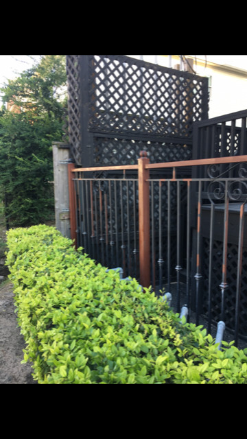 Wrought Iron Fence Renewed & Repainted.