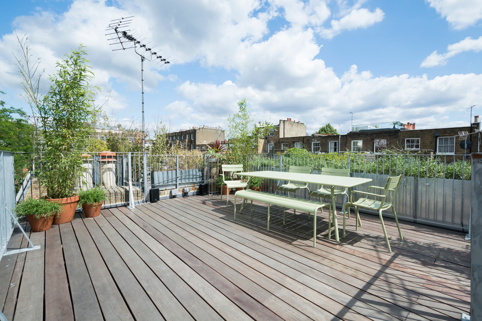 Traditional rooftop and rooftop deck in London with no cover.