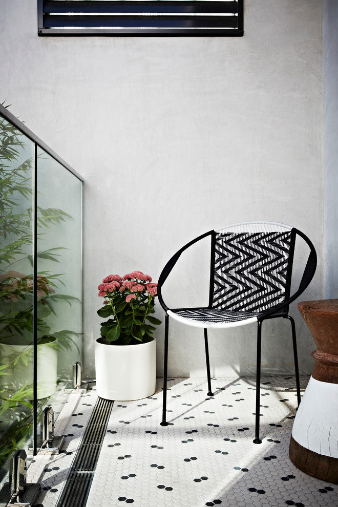 This is an example of a small contemporary courtyard garden in Melbourne.