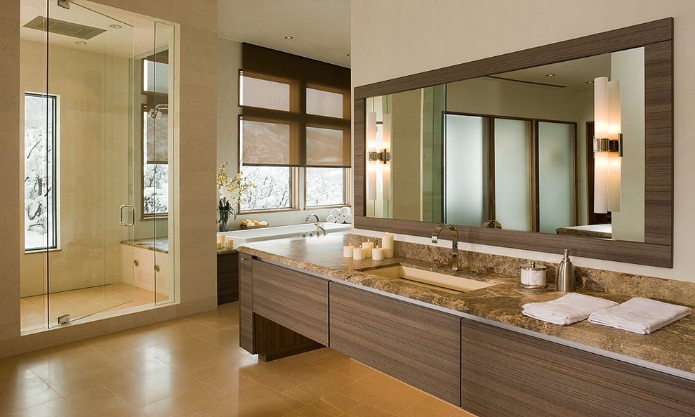 Large contemporary master bathroom in Denver with flat-panel cabinets, dark wood cabinets, a freestanding tub, an alcove shower, beige walls, an undermount sink and granite benchtops.