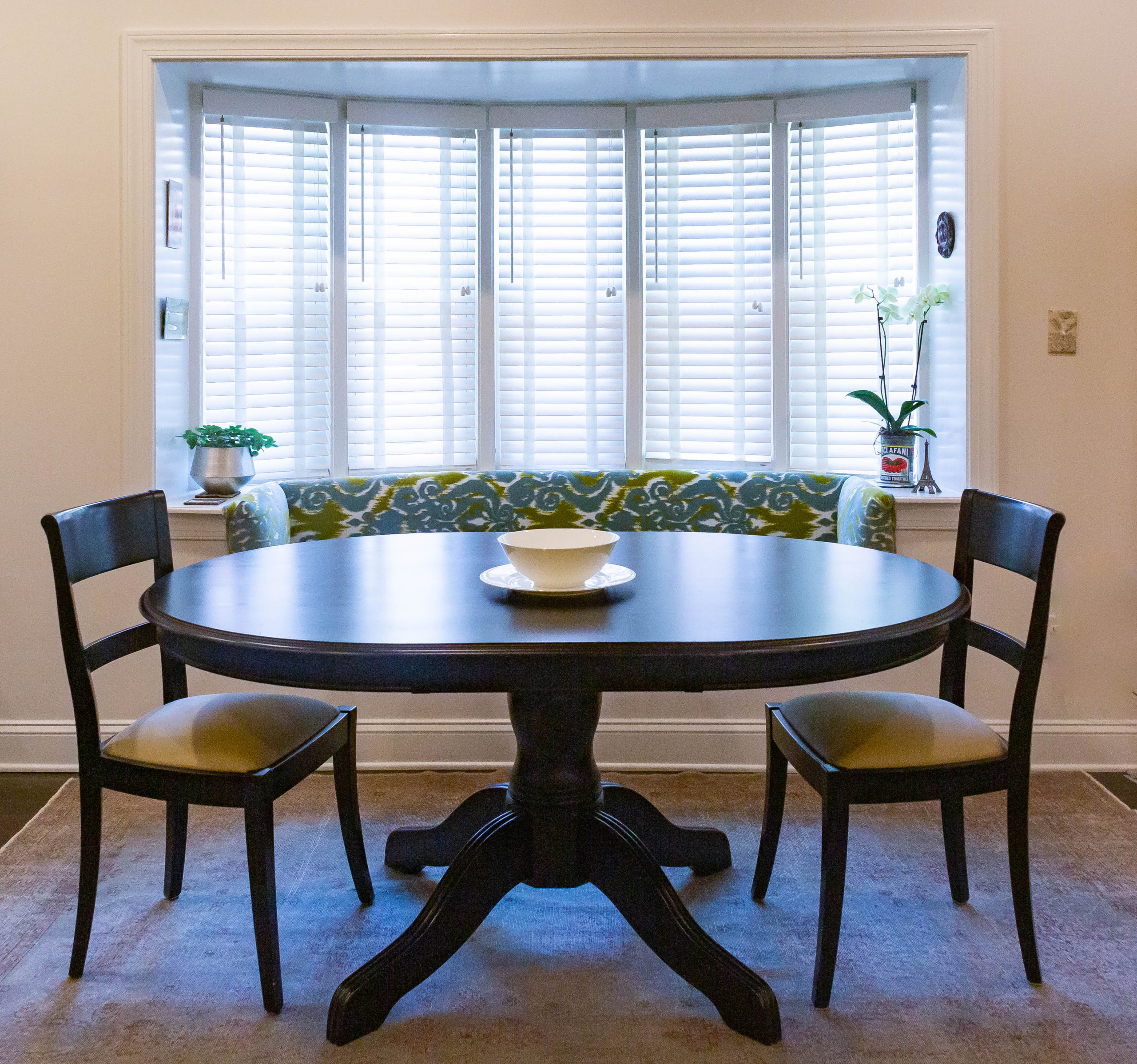 Bay window next to dining table