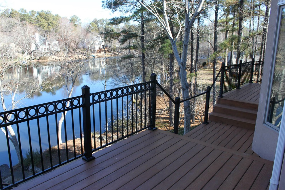 Inspiration for a large backyard balcony deck remodel in Atlanta with no cover