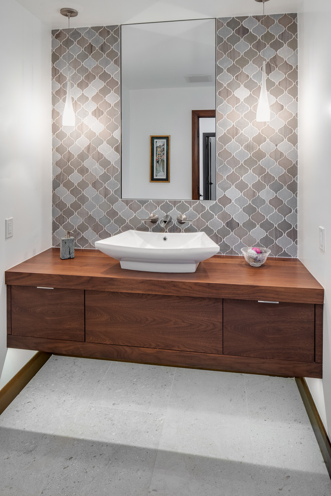 Inspiration for a modern powder room in Orange County.