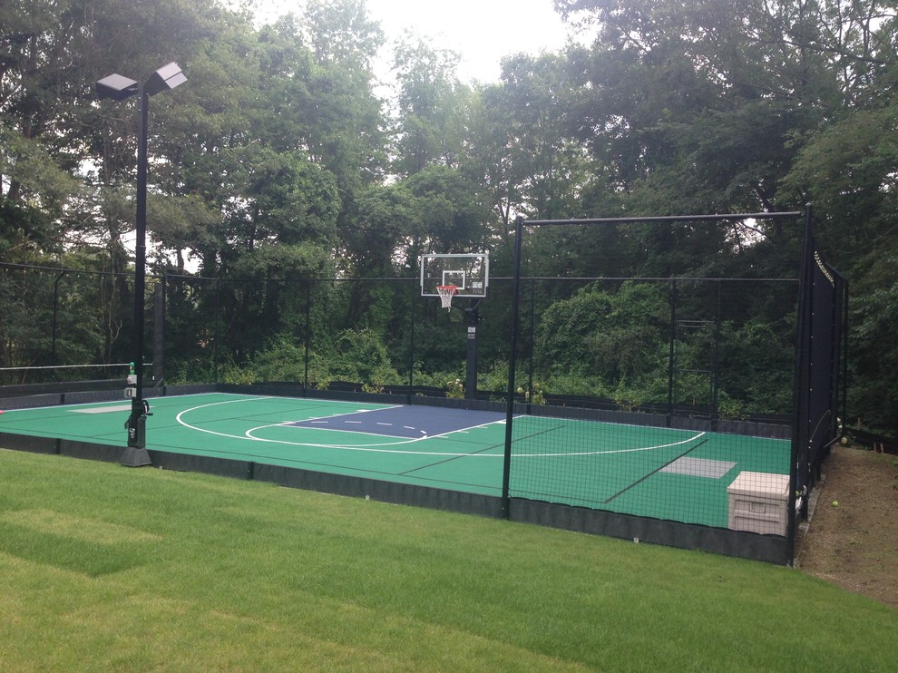 Small traditional backyard partial sun outdoor sport court in Boston with concrete pavers.