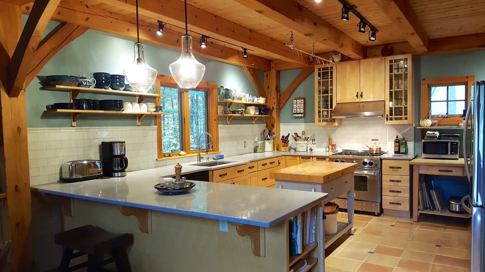 Inspiration for a mid-sized rustic u-shaped terra-cotta tile and beige floor eat-in kitchen remodel with an undermount sink, shaker cabinets, light wood cabinets, quartz countertops, white backsplash, subway tile backsplash, stainless steel appliances, a peninsula and gray countertops