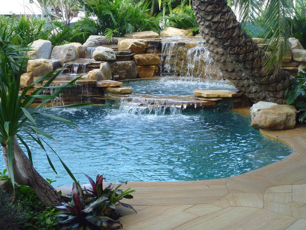 Waterfalls into pool in Florida Tropical Miami by Matthew Giampietro Garden Design Houzz