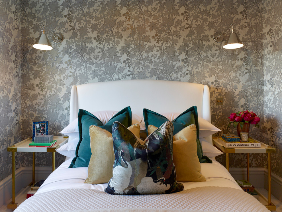 This is an example of a small transitional guest bedroom in London with grey walls, carpet and grey floor.