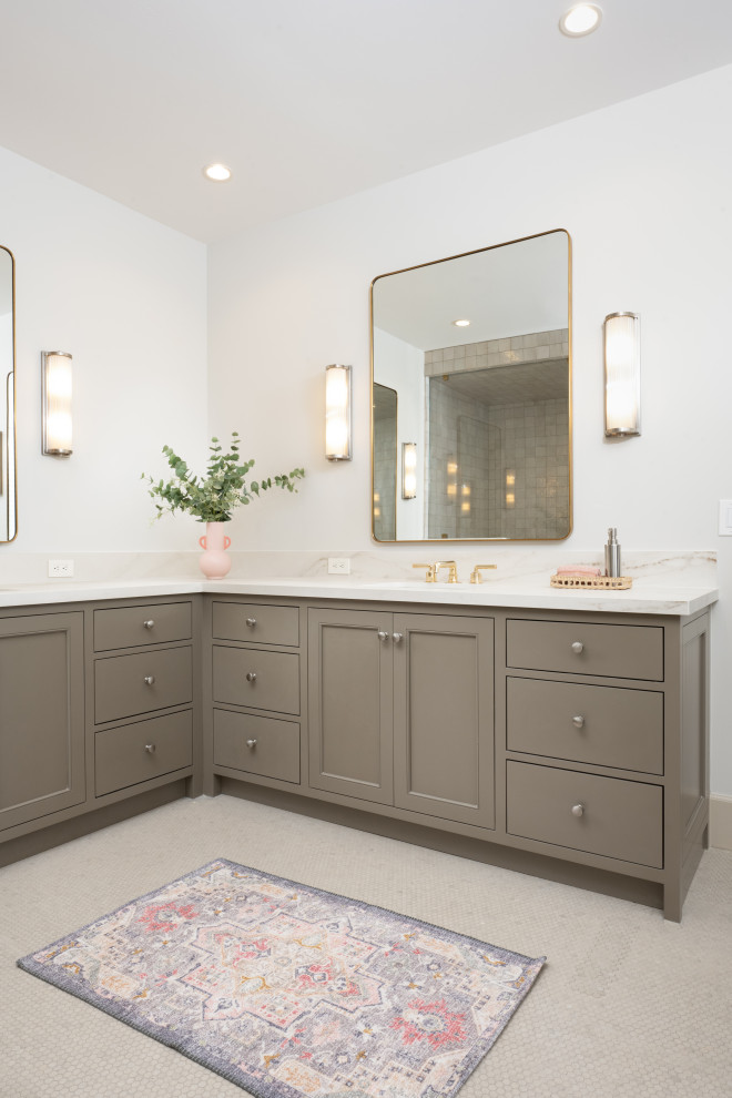 This is an example of a large traditional master bathroom in San Francisco with beaded inset cabinets, green cabinets, a freestanding tub, a corner shower, a one-piece toilet, beige tile, ceramic tile, beige walls, ceramic floors, an undermount sink, engineered quartz benchtops, beige floor, a hinged shower door, beige benchtops, a shower seat, a double vanity and a built-in vanity.