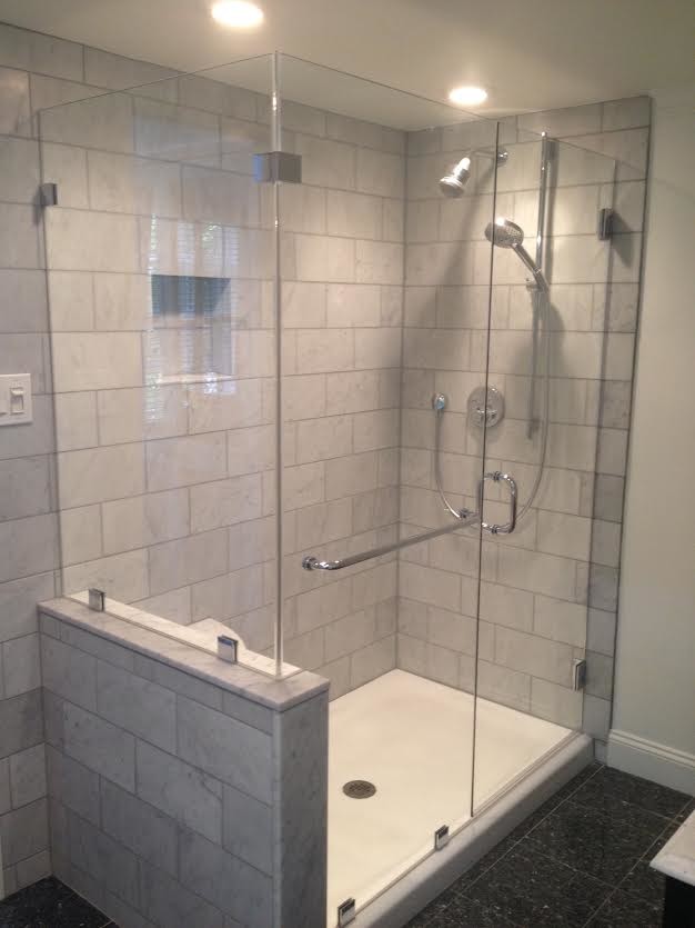 Photo of a traditional bathroom in Philadelphia with a corner shower, gray tile, subway tile and grey walls.